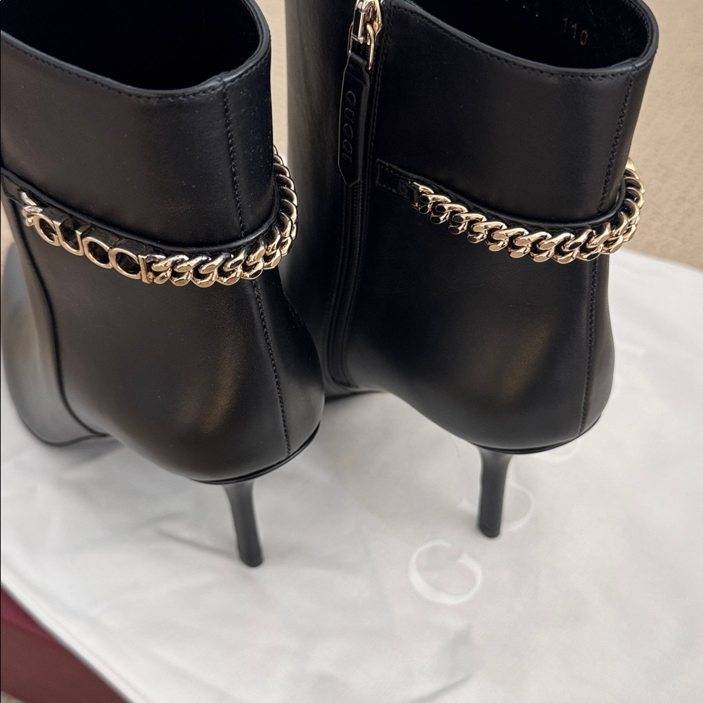 NIB-Gucci Black Heeled Boots with Gold Chain
Size 41 - Picture 10 of 10